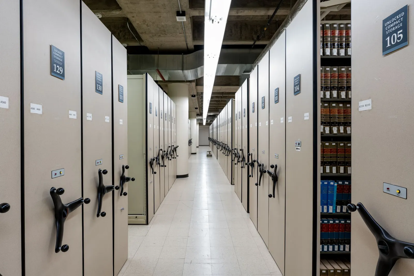 Compact shelving lining a reference archive